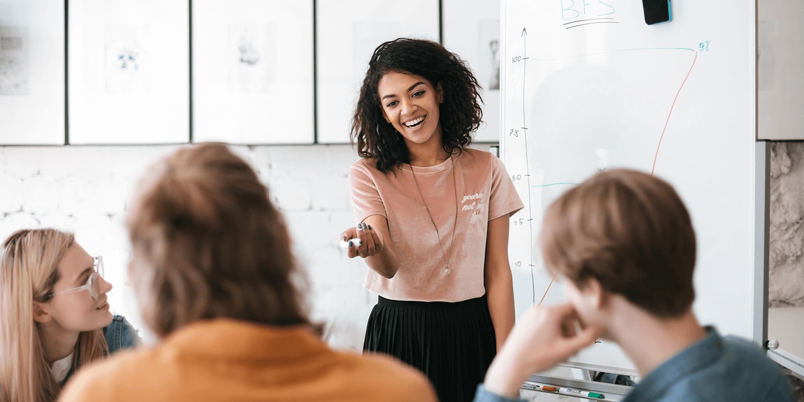 Two College Tutors Having Discussion Together | Credit: Monkey Business/Adobe Stock